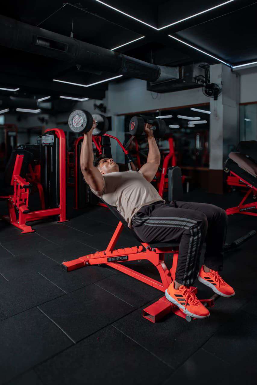 Member training with dumbbells